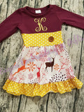 Leaping deer, snowflake print with burgundy and mustard colors