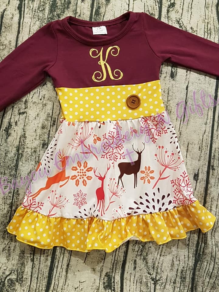 Leaping deer, snowflake print with burgundy and mustard colors